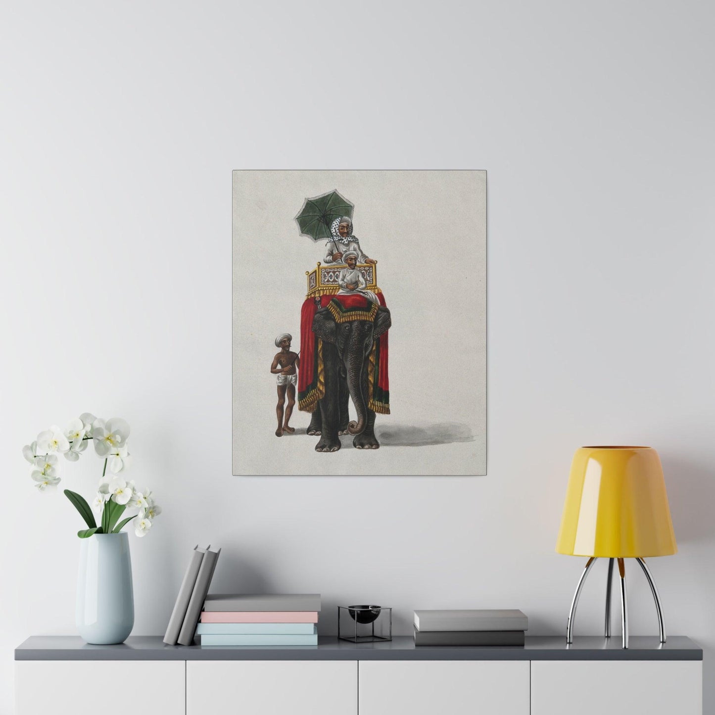 A wealthy man holding an umbrella sitting on the back of a rug draped Indian elephant Gouache painting on a Matte Canvas Stretched 0.75